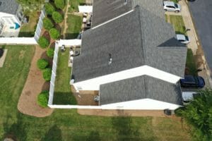 Overhead view of an asphalt shingle roof on home in a neighborhood